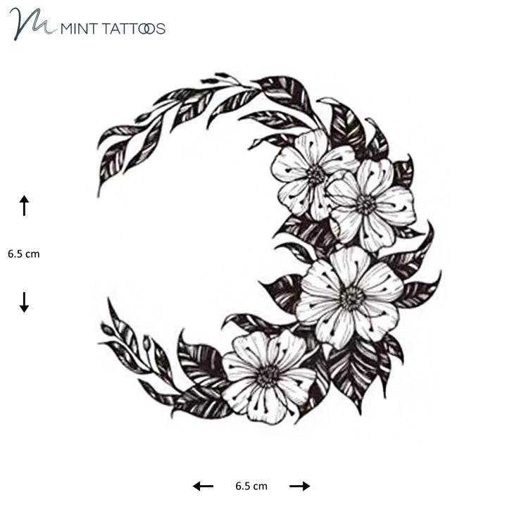 Temporary tattoo from Mint Tattoos. Dot line style flowers in moon shape