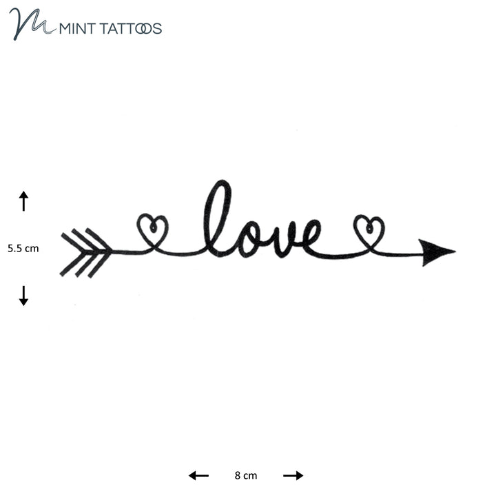 Temporary tattoo from Mint Tattoos.  Script text, love, with 2 hearts and an arrow front