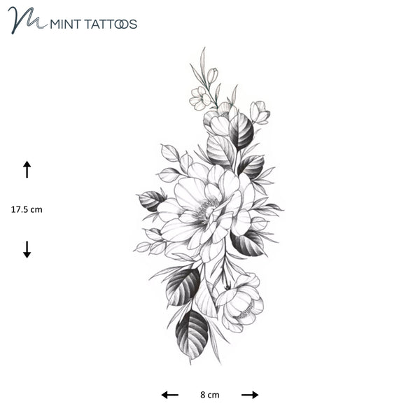 Temporary tattoo from Mint Tattoos.  Looks pencil drawn, a large open flower with leaves and a few surrounding buds. Measures 8 x 17 cm