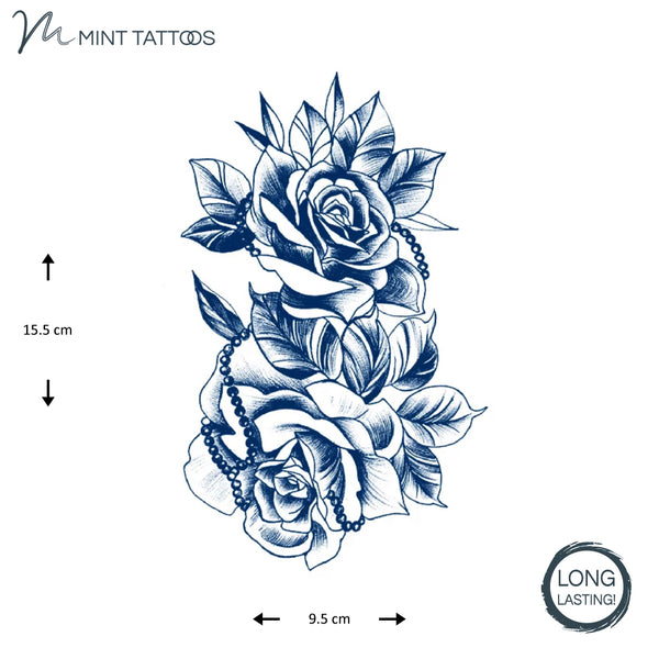 Long lasting Temporary tattoo.  Two large roses with leaves and beads woven throughout, appearing to be a sketch