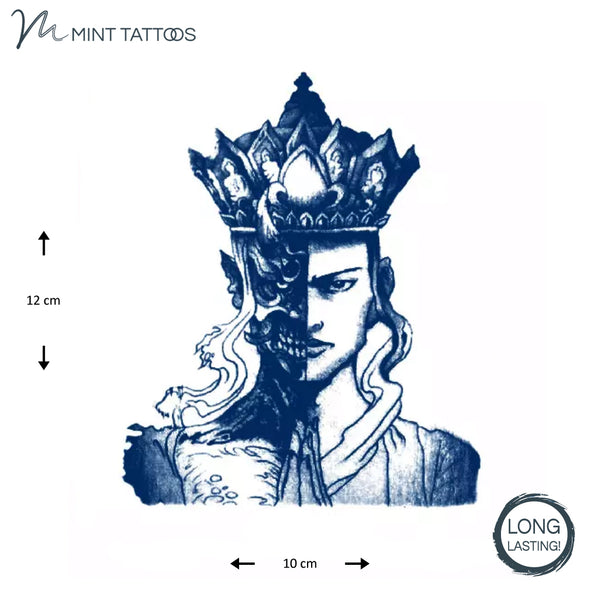 Long lasting temporary tattoo from Mint Tattoos. Ink blue color, half man, half skeleton, in a crown