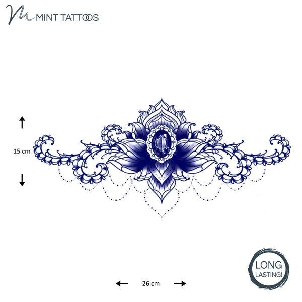 Wide long lasting temporary chest or back tattoo. Center faceted jewel with ornamental designs on the left and right