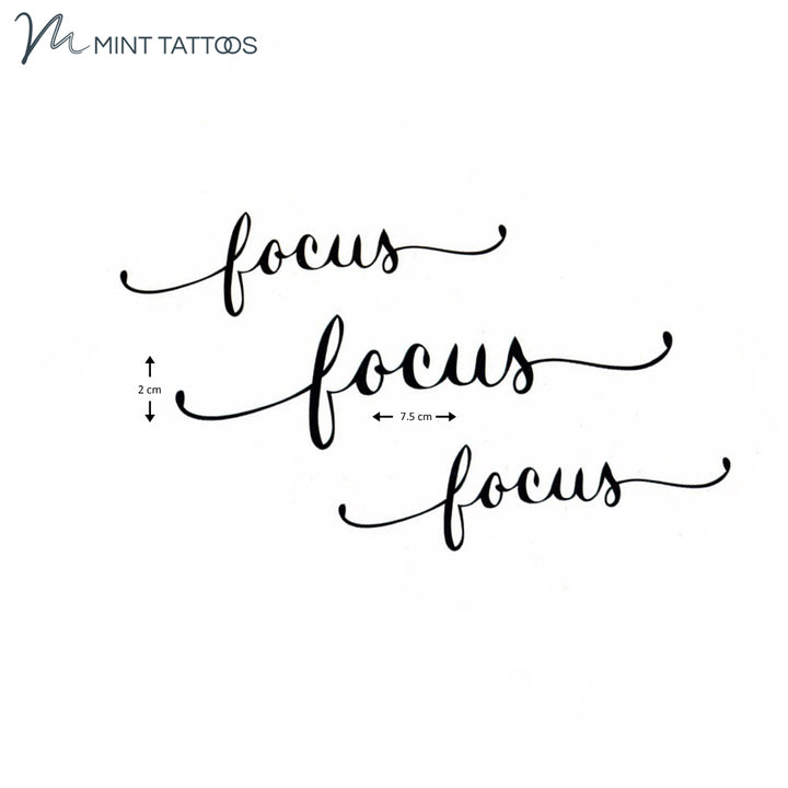 Temporary tattoo from Mint Tattoos. The single word "focus" in lower case script, 3 quantity