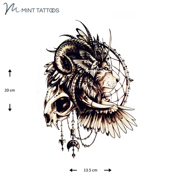 Temporary tattoo from Mint Tattoos. A collage image that includes a lion side profile, part of an animal skull, ram horns, tusks and wings among more.. Measures 13 x 20 cm