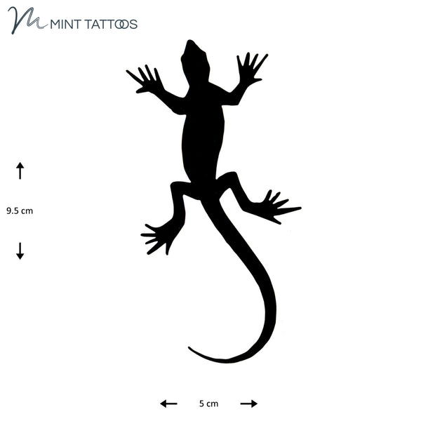 Temporary tattoo from Mint Tattoos. Solid black silhouette of a gecko lizard, 5 x 9 cm