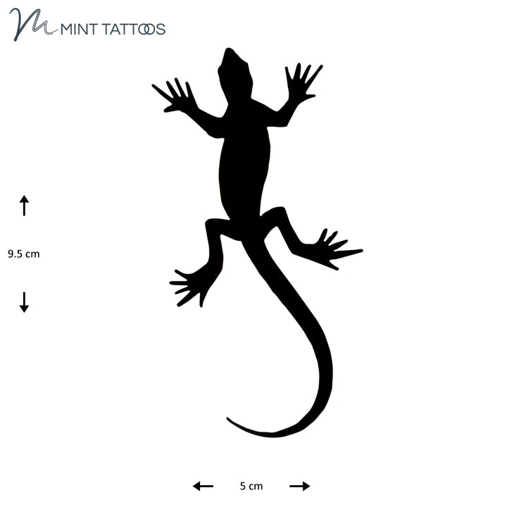 Temporary tattoo from Mint Tattoos. Solid black silhouette of a gecko lizard, 5 x 9 cm