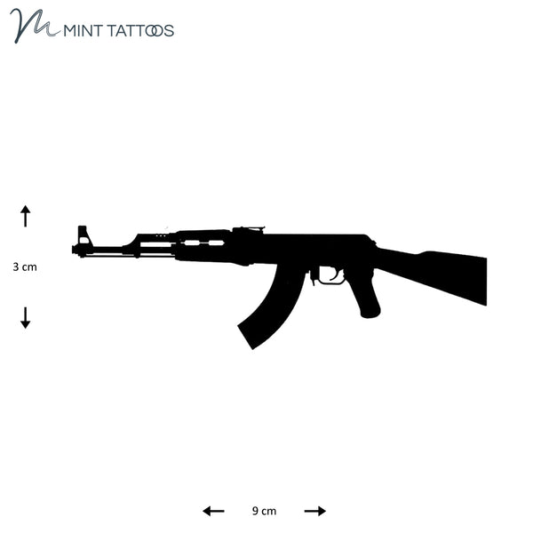 Temporary tattoo from Mint Tattoos. Black side silhouette of a machine gun