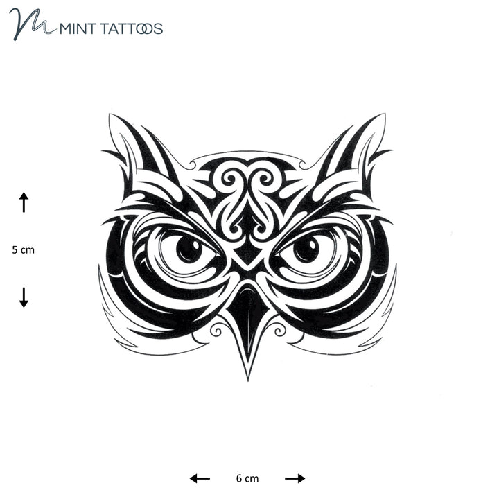 Temporary tattoo from Mint Tattoos. Bold black staring owl face. Measures 5 x 6 cm