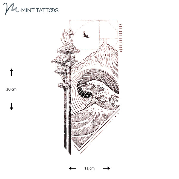 Temporary tattoo from Mint Tattoos. Drawn in a dot line style, 2 tall trees, a cresting wave, tall mountain and eagle in flight. Measures 11 x 20 cm