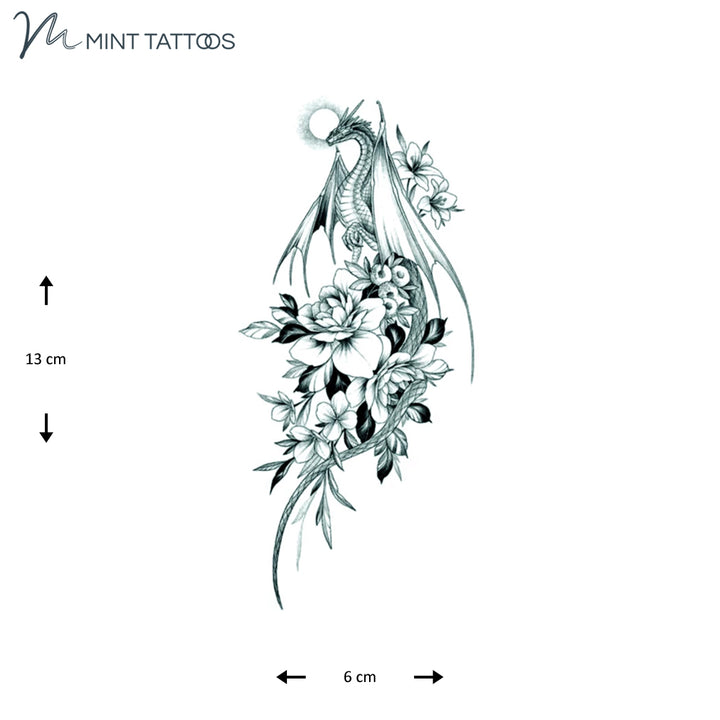 Temporary tattoo from Mint Tattoos.  Dragon with large wings and a long tail with a large flower bouquet