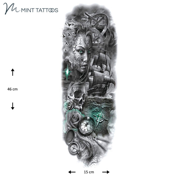 Full sleeve temporary tattoo. A collage image including a pretty woman, a ship in stormy seas, a skull and many nautical items.  All in black except a few green highlights