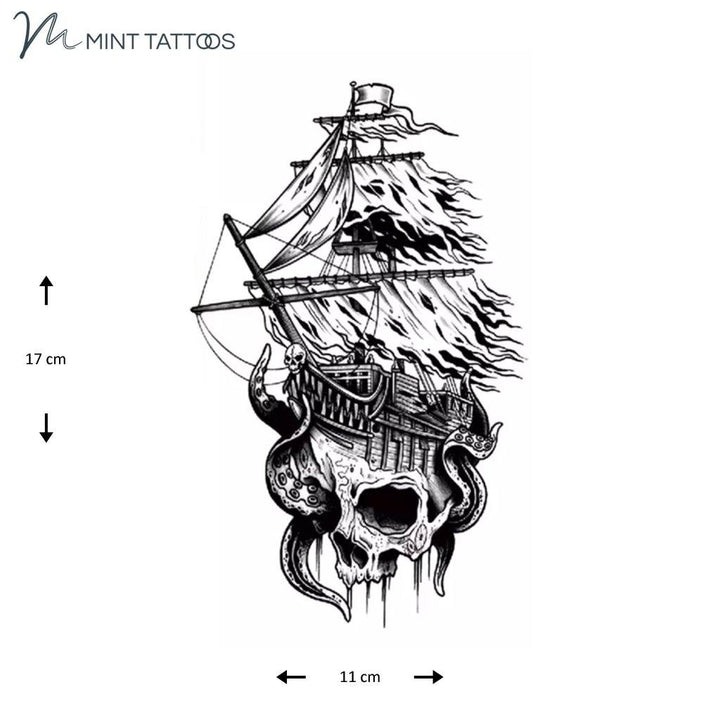 Temporary tattoo from Mint Tattoos. A hand drawn ship with a skull as a base with octopus tentacles. Masts are torn and blowing