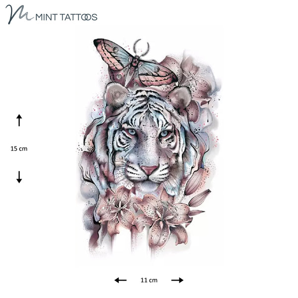 Temporary tattoo from Mint Tattoos. Face of tiger surrounded by lilies and a butterfly, all in pinks and purples. Measures 11 x 15 cm