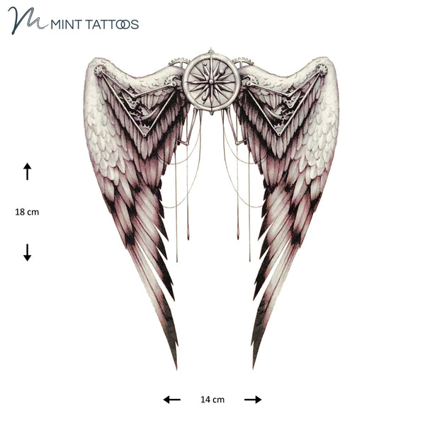 Temporary tattoo from Mint Tattoos.  Shaded black design of angel wings with a steam punk style elements. Measures 14 x 18 cm