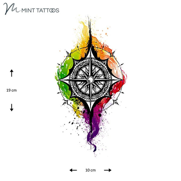 Temporary tattoo from Mint Tattoos brightly colored inky background with a black compass